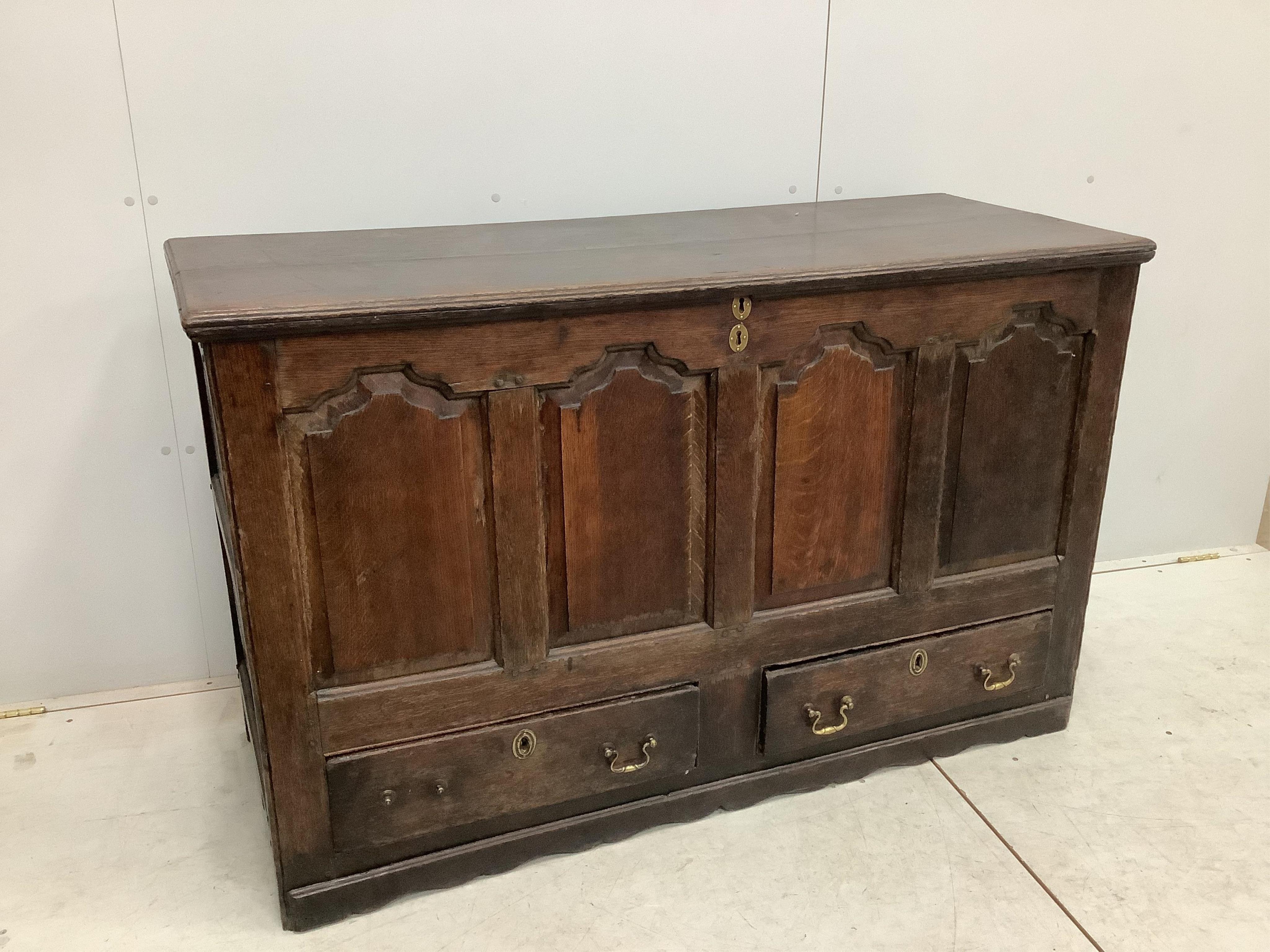 An 18th century oak mule chest, width 140cm, depth 53cm, height 88cm. Condition - fair